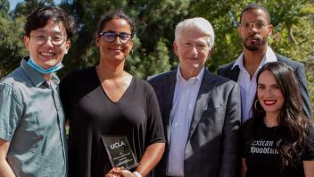 Chancellor Gene Block with Public Impact Research Awards 2022 Awardees.