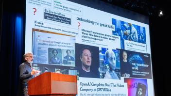 Keith Holyoak presenting slide 1 showcasing different article headlines